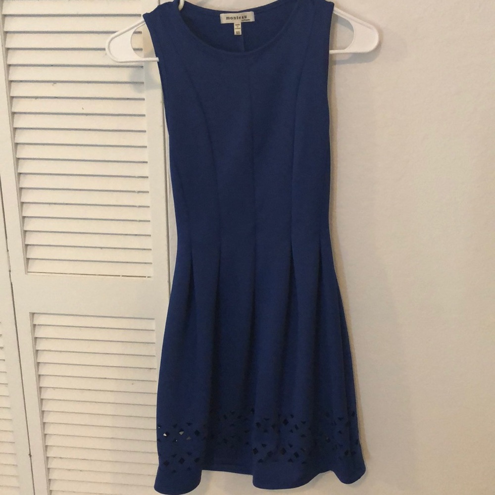 New with no tag. Elegant blue dress with design